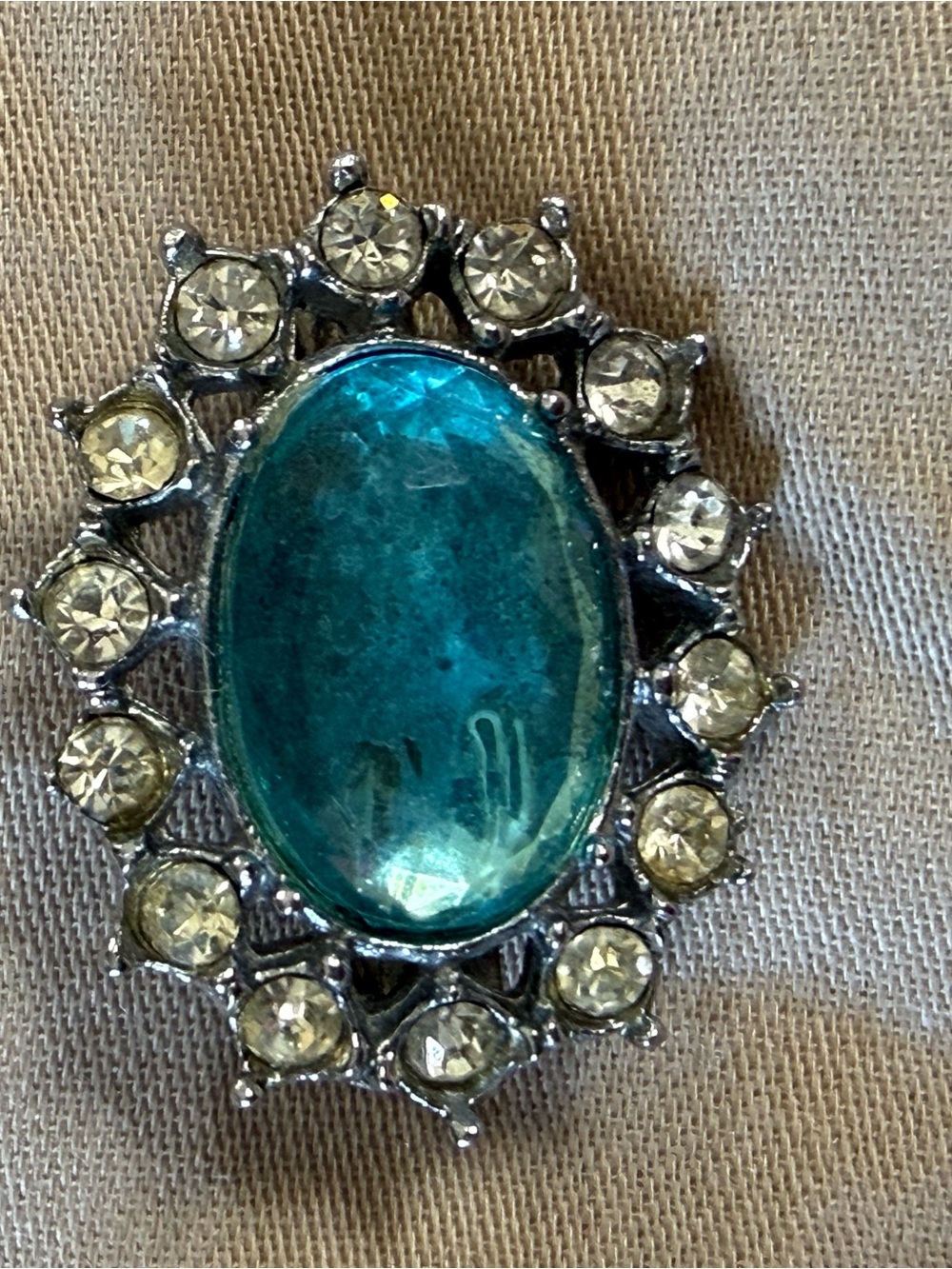 Vintage Oval Blue Rhinestone Brooch with Surrounding Clear Stones Silver Tone